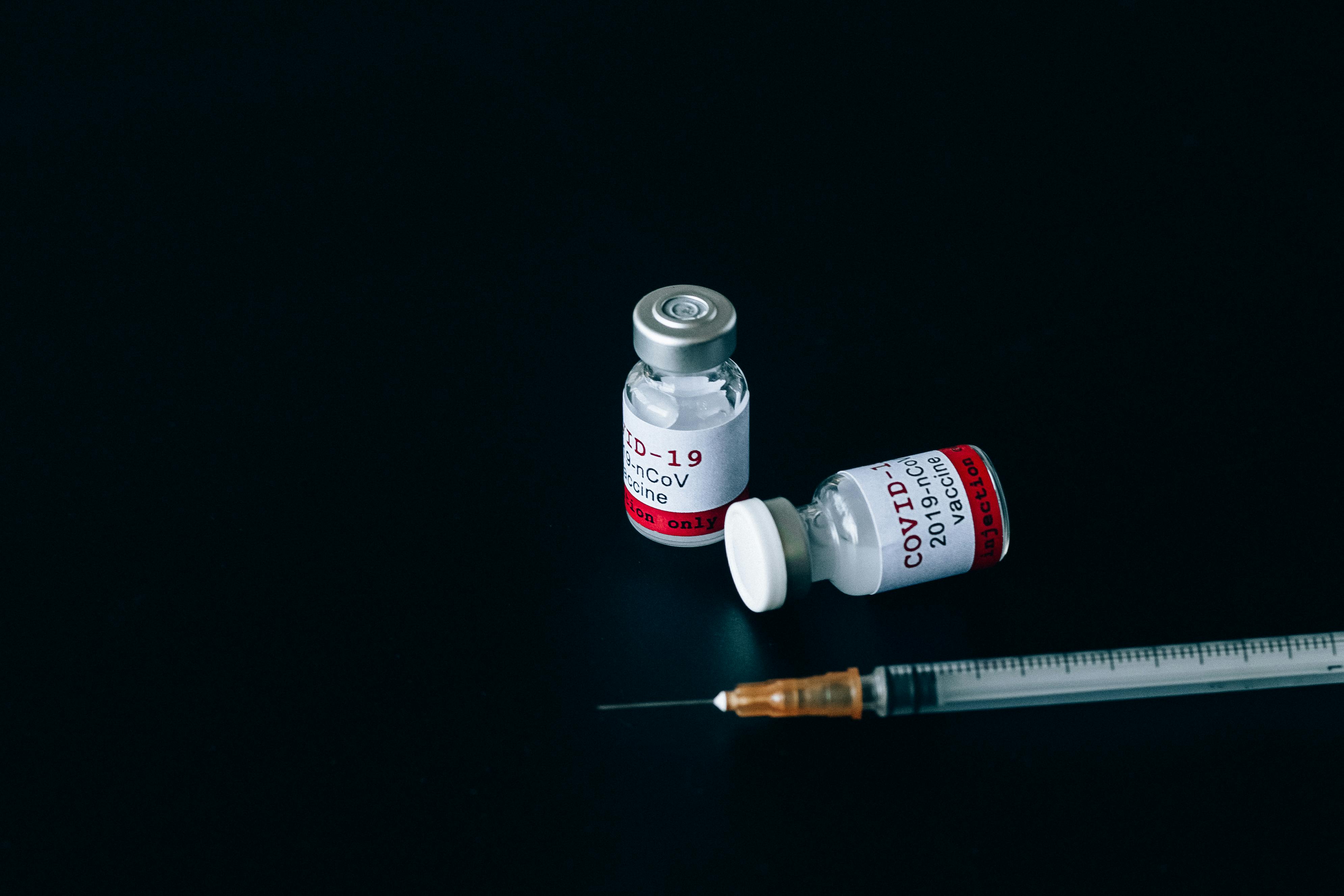 Image of a syringe and medication.