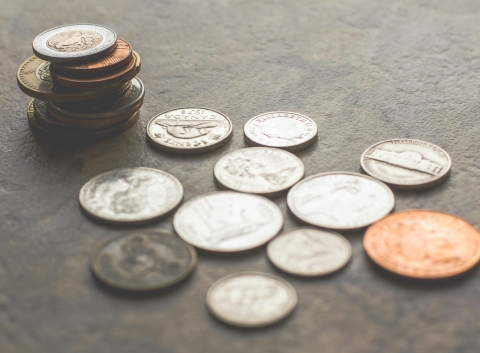 Coins laying on a table