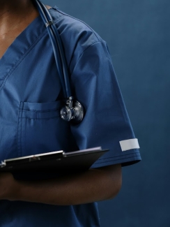 nurse holding clipboard